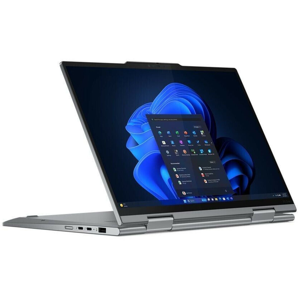 A silver tecwheels Lenovo ThinkPad X1 14-inch convertible laptop in tent mode shows the Windows 11 Pro Start menu on a dark blue abstract background, powered by Intel Core Ultra 7, with visible side ports. Specs: 16GB RAM, 512GB SSD.