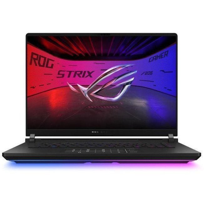 The tecwheels Rog Strix Scar 16 G635Lx Rw042W is a 16-inch 240Hz gaming laptop with an RGB-lit keyboard, RTX 5090 graphics, dual SSDs, 64GB RAM, and a display featuring the ROG Strix logo amid red and blue lighting with "GAMER" and "ROG" in the background.